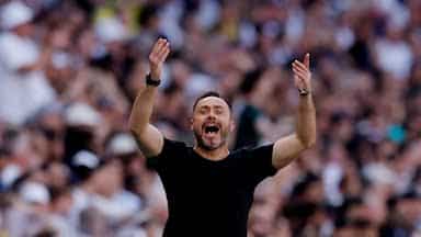 Tottenham Hotspur's new coach, Roberto De Zerbi celebrates his club's Premier League survival.