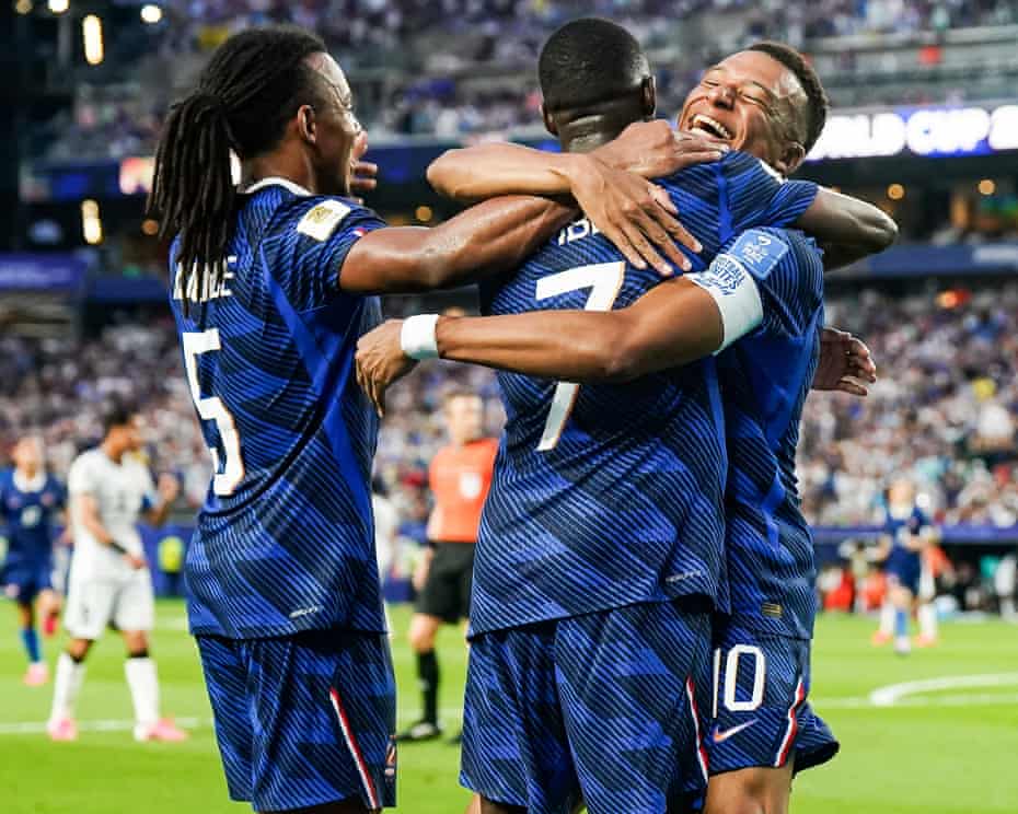 Kylian Mbappe celebrates with his teammates after scoring a brace against Iraq.