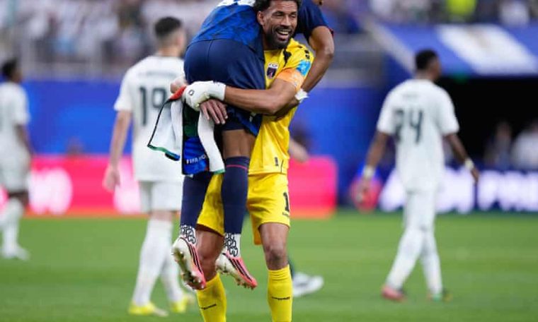 Cape Verde Goalkeeper, Vozinha celebrates with a teammate after booking themselves a place at 2026 World Cup round of 32.