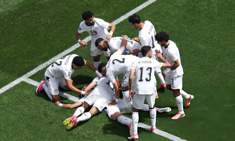 Egyptian footballers celebrate their goal against Belgium at the 2026 FIFA World Cup on Monday, June 15.