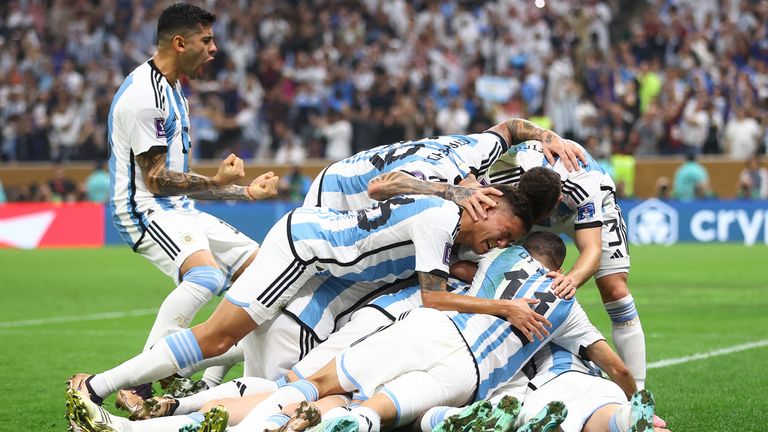 Argentina players celebrate their qualification to the round of 32 at the 2026 FIFA World Cup.