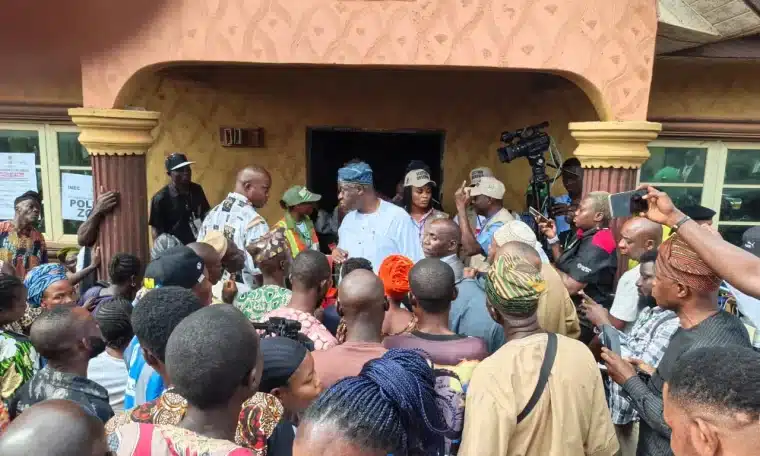PDP candidate Wole Oluyede arrives at Polling Unit 6, Osagburu Hall, Ward 3, Ikere Ekiti, to cast his vote.