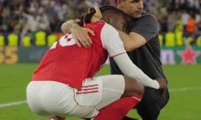 Coach Mikel Arteta consoling Eberechi Eze after losing the Champions League Final to PSG.