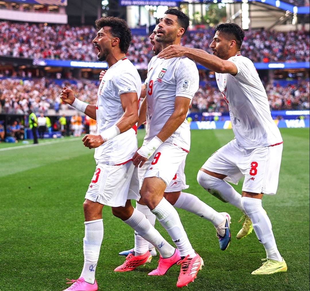 Iranian players celebrate after scoring against New Zealand at the 2026 FIFA World Cup.