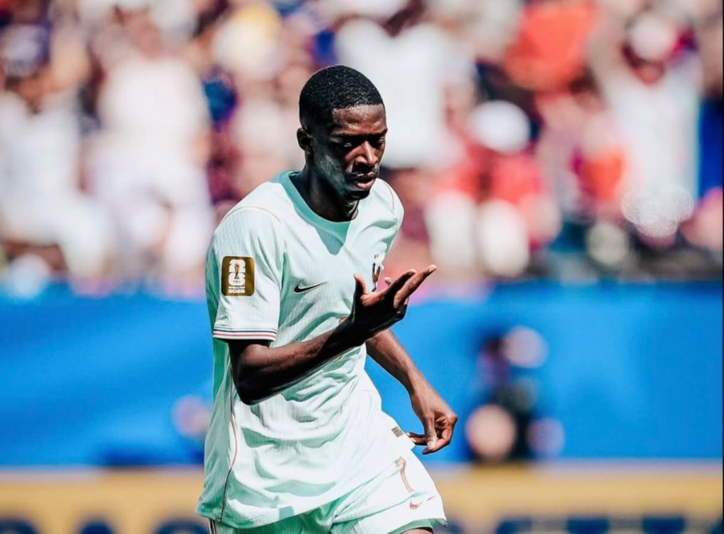 Ousmane Dembélé celebrates after scoring his first World Cup hat-trick.