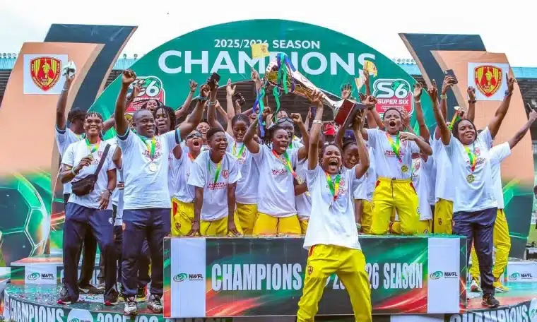 Edo Queens players lift the NWFL title after winning the 2026 Super six in Port Harcourt on Sunday, June 14.