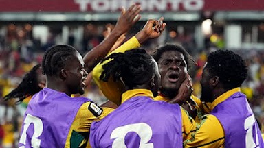 Ghana players celebrate their World Cup goal against Panama.