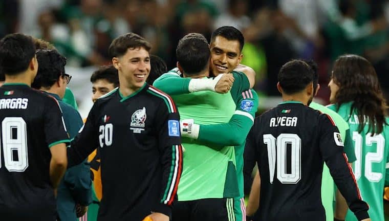 Mexican players celebrate after securing their place to the next round of the 2026 FIFA World Cup.