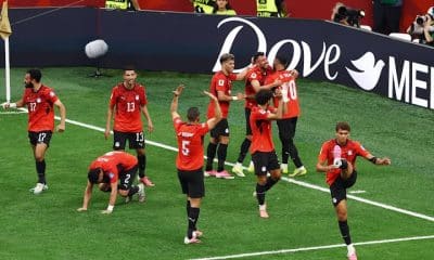 Egyptian players celebrate their first-ever FIFA World Cup win.