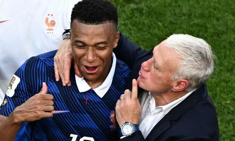Kylian Mbappe and France coach Didier Deschamps