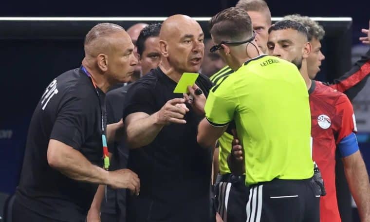 Egypt head coach Hossam Hassan argues with the referee during the World Cup clash with Argentina.