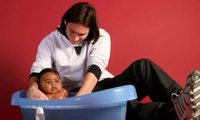 File photo of Lionel Messi bathing baby Lamine Yamal.