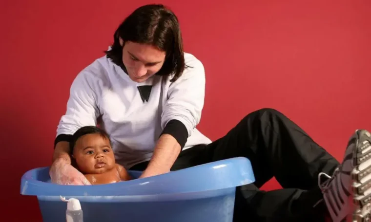 File photo of Lionel Messi bathing baby Lamine Yamal.