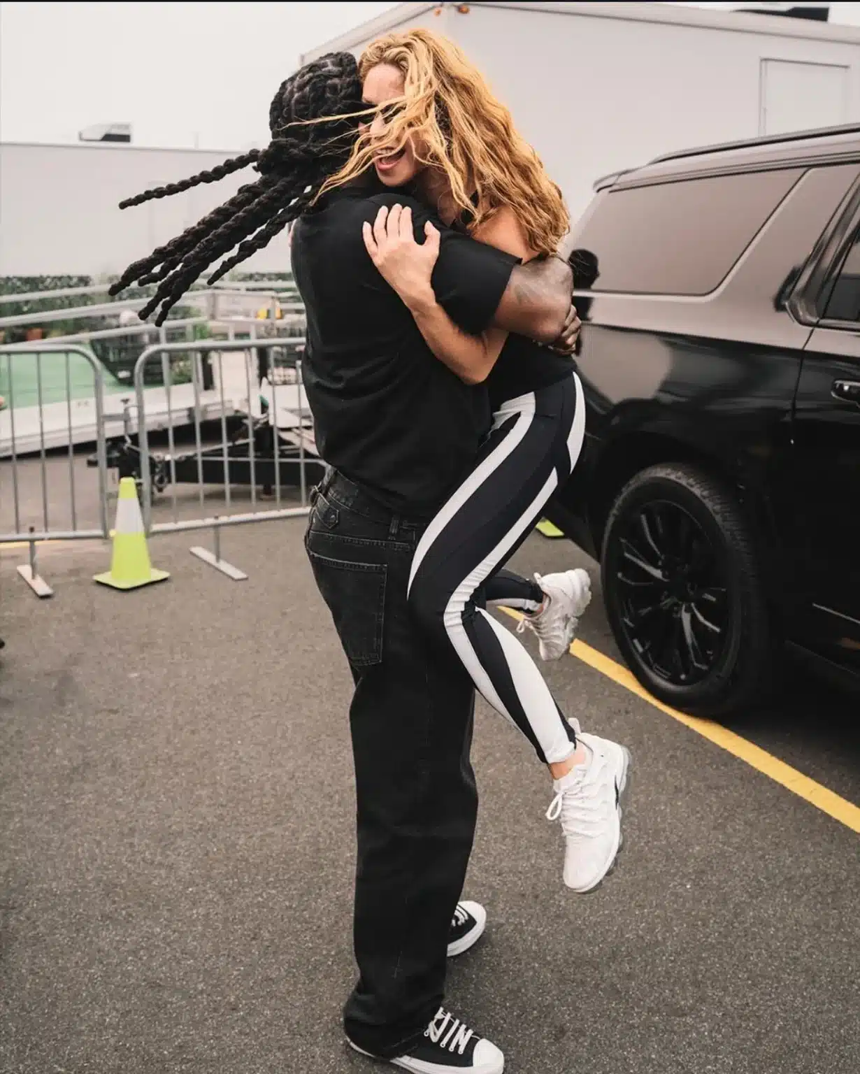 Burna Boy giving Shakira a hug ahead of their World Cup half-time show performance.