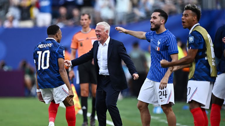 Kylian Mbappe celebrates with France head coach, Didier Deschamps at the 2026 World Cup.
