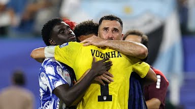 Cape Verde players console themselves after losing to Argentina in the World Cup round of 32.
