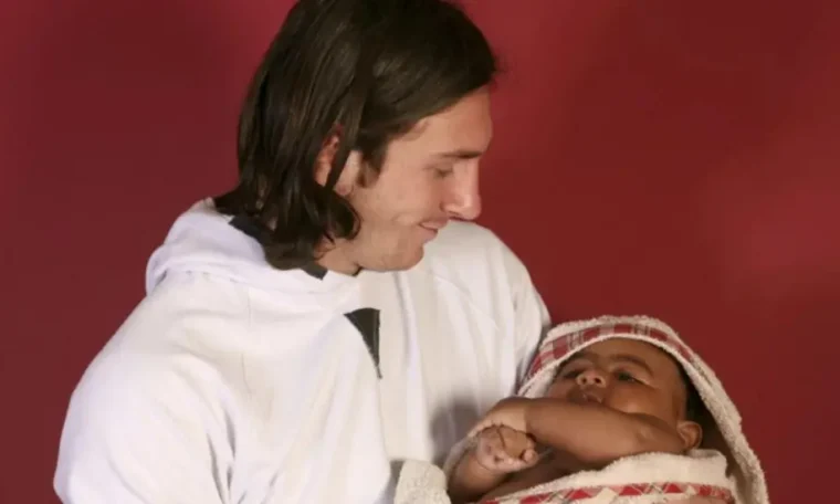 File photo of Lionel Messi carrying baby Lamine Yamal.