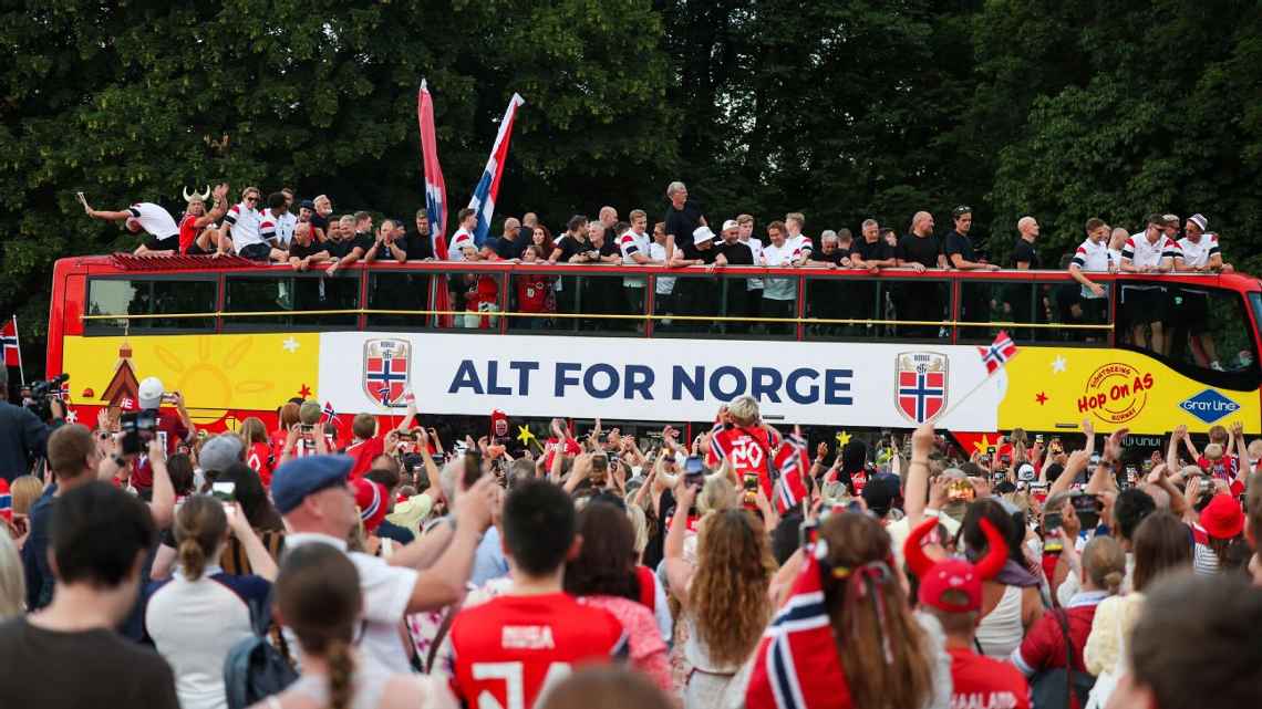 Norwegians lineup the streets to welcome back the Norway national team from the 2026 FIFA World Cup. 