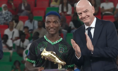 Temwa Chawinga and FIFA President Gianni Infantino after receiving the Golden Boot award at the 2026 WAFCON.