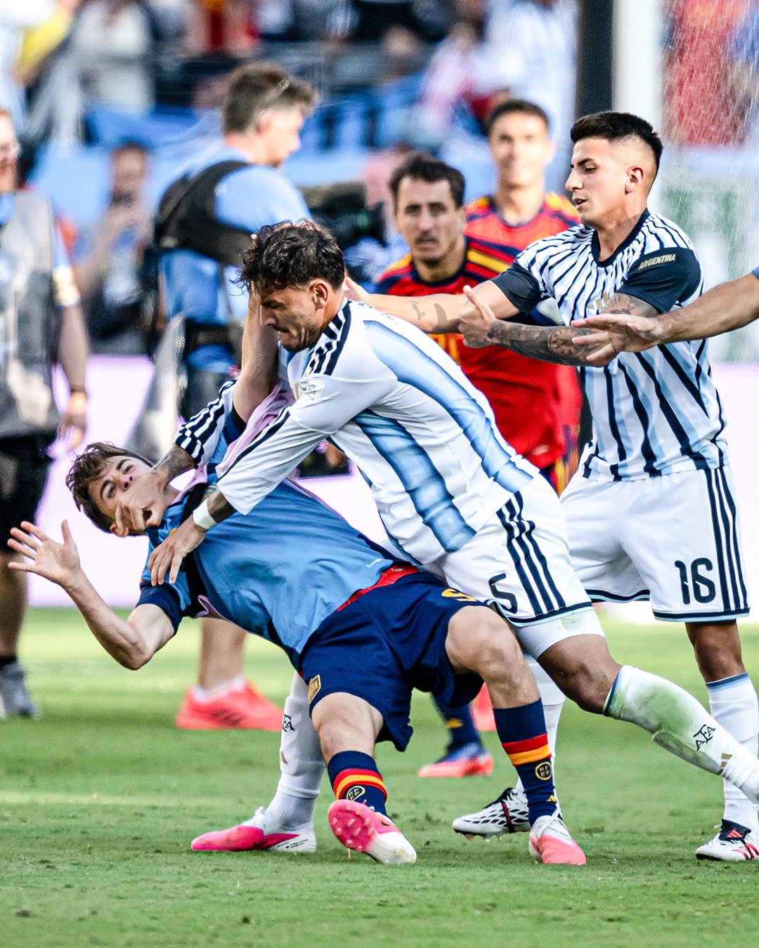 Leandro Paredes battling with a Spanish player after the final whistle of the 2026 FIFA World Cup.