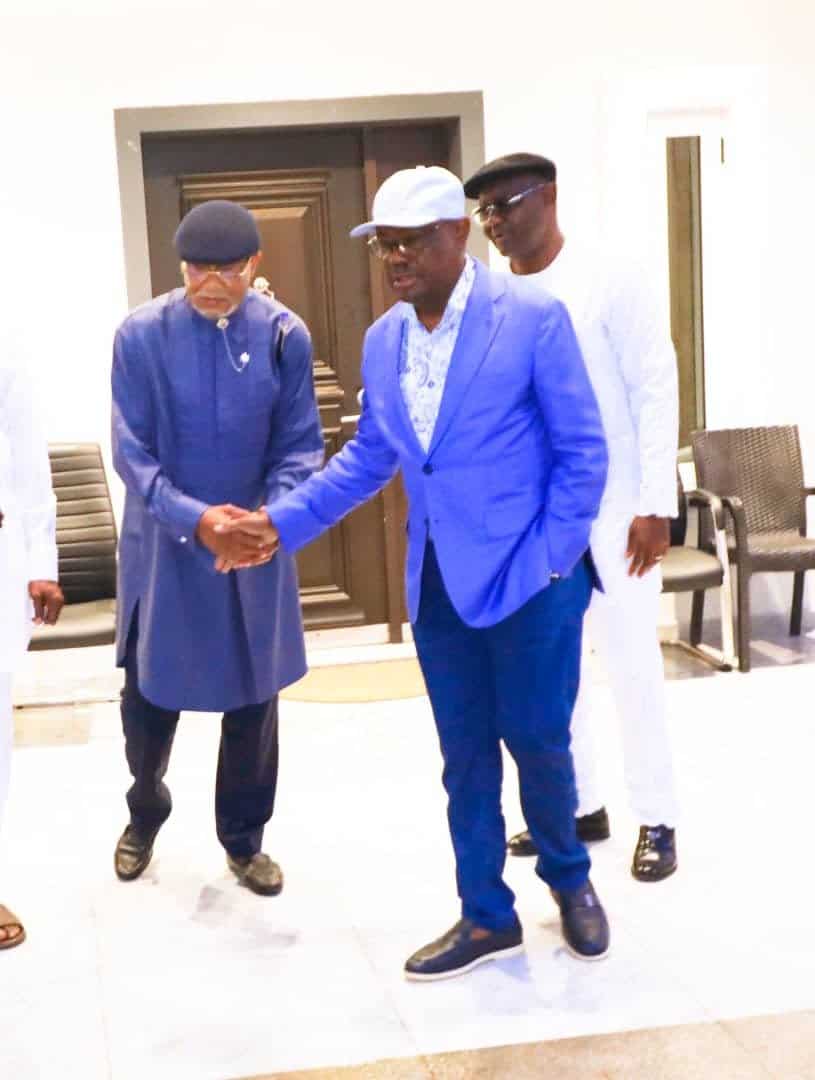 Sam Sam Jaja shakes hands with Nyesom Wike