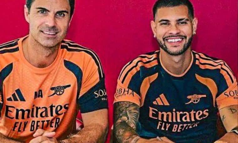 Arsenal manager Mikel Arteta posing with his new signee, Bruno Guimaraes.