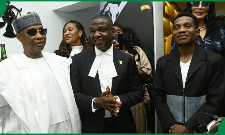 Retired Deputy Inspector-General of Police Frank Mba (middle) and other dignitaries, during the opening of his legal office in Abuja.