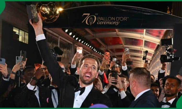Harry Kane celebrating with fans after winning the 2026 Ballon d'Or.