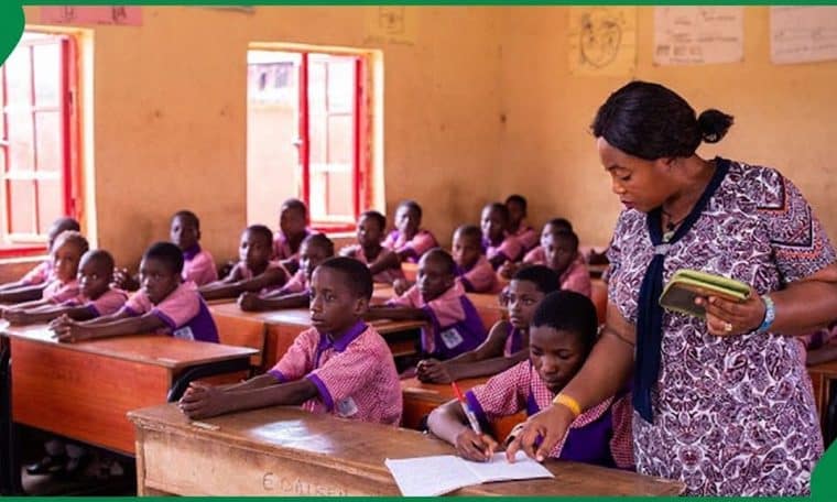 Teacher attending to school children